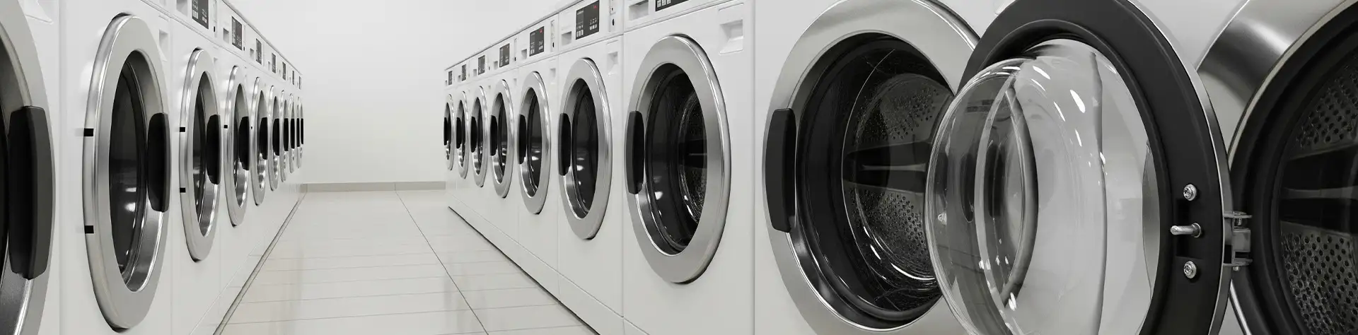 Laundry room with multiple washing machines using ozone for laundry.